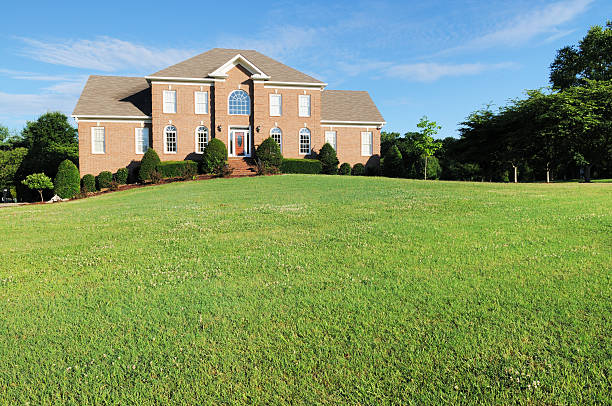 Weed-free front lawn and custom fertilization results on residential estate